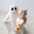 Ghost and ginger cat
