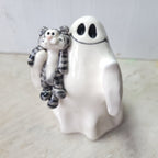 Ghost and tabby cat