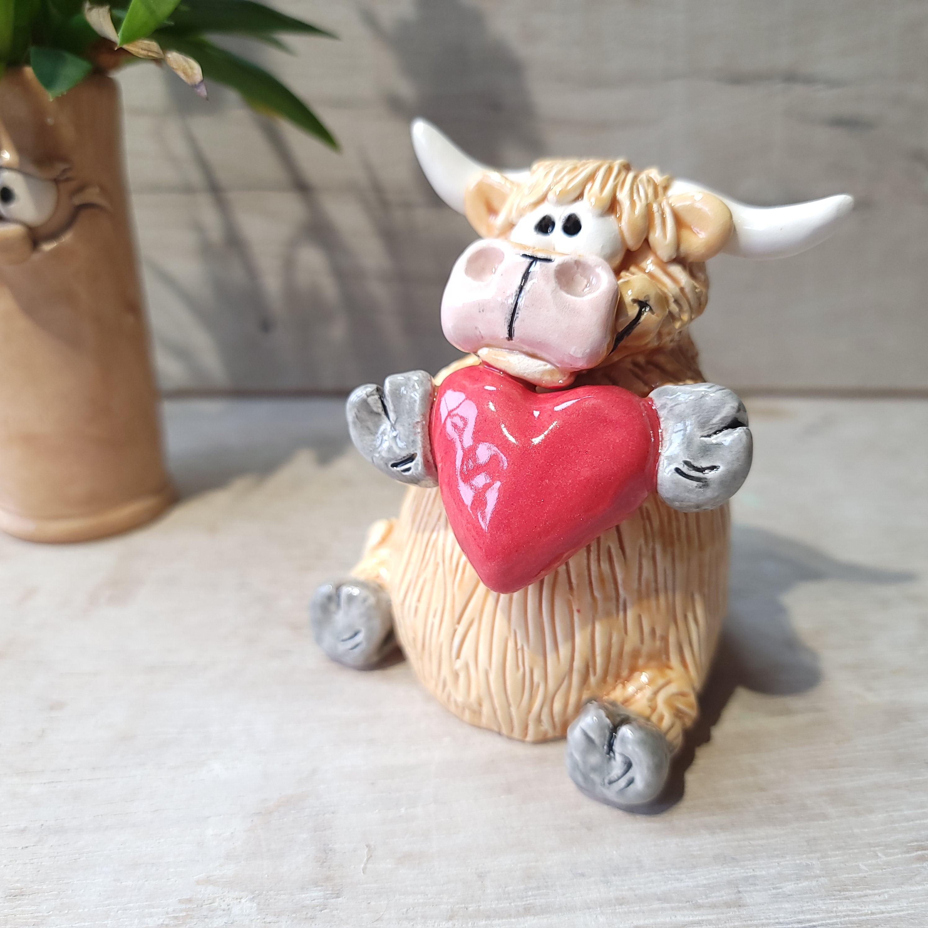 Highland cow with heart ❤️