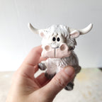 Funny speckled cow