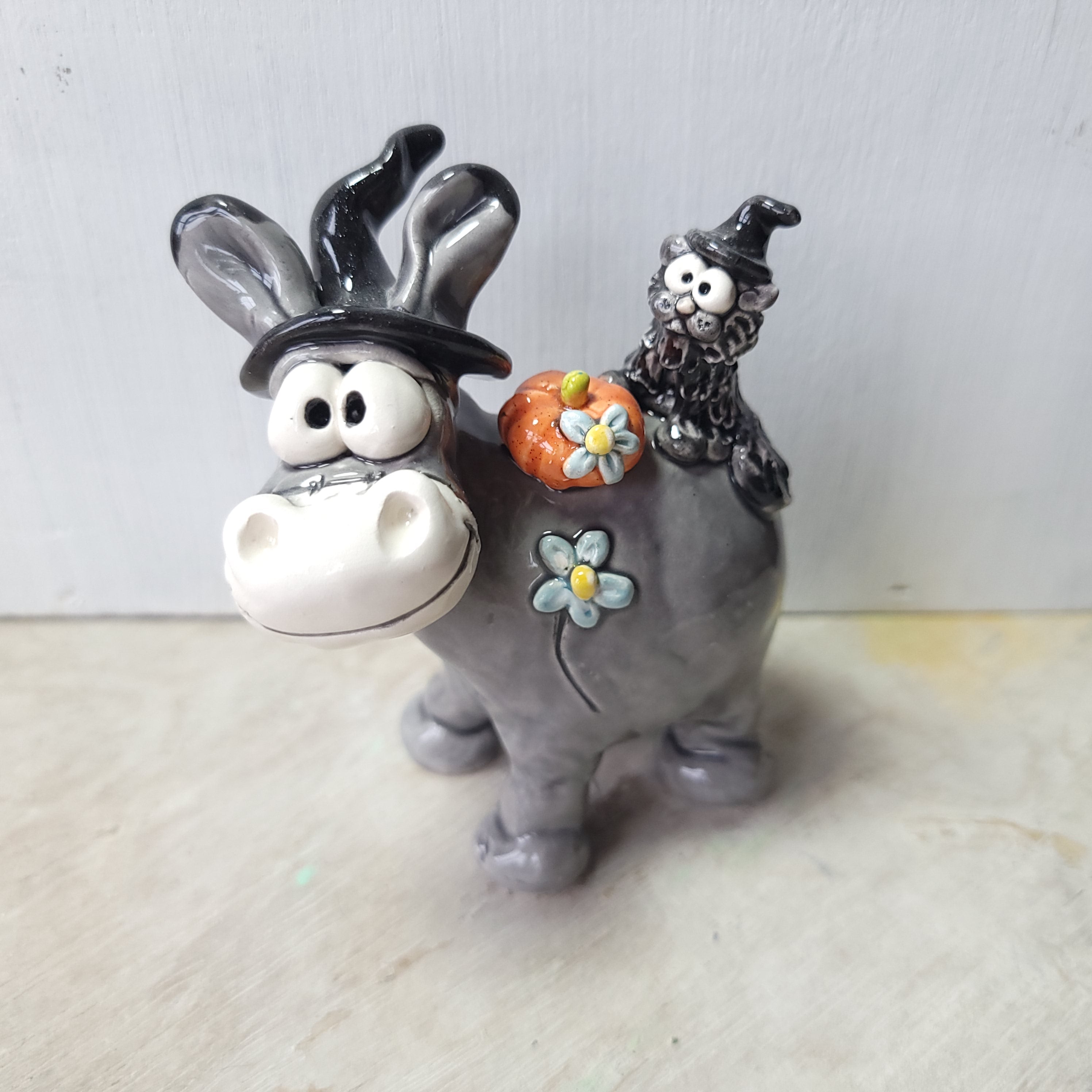 Donkey, cat and pumpkin