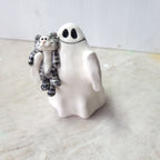 Ghost and tabby cat